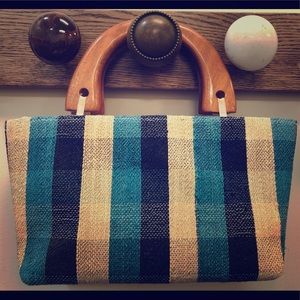 Clutch striped blue & beige with wooden handles.